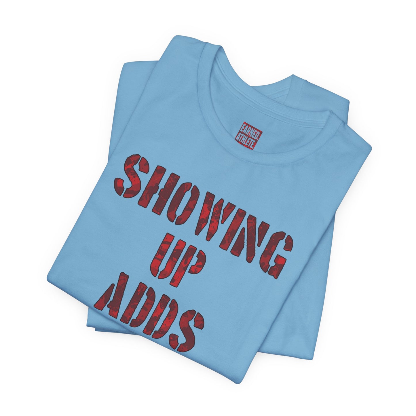 SHOWING UP ADDS UP Tee (Red Camo Font)