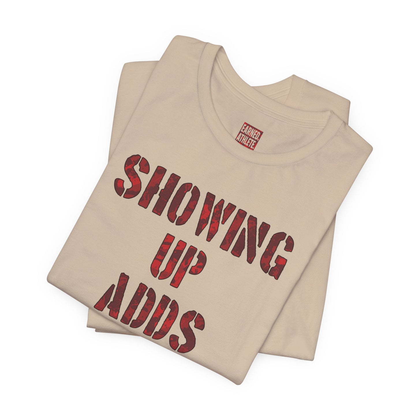 SHOWING UP ADDS UP Tee (Red Camo Font)