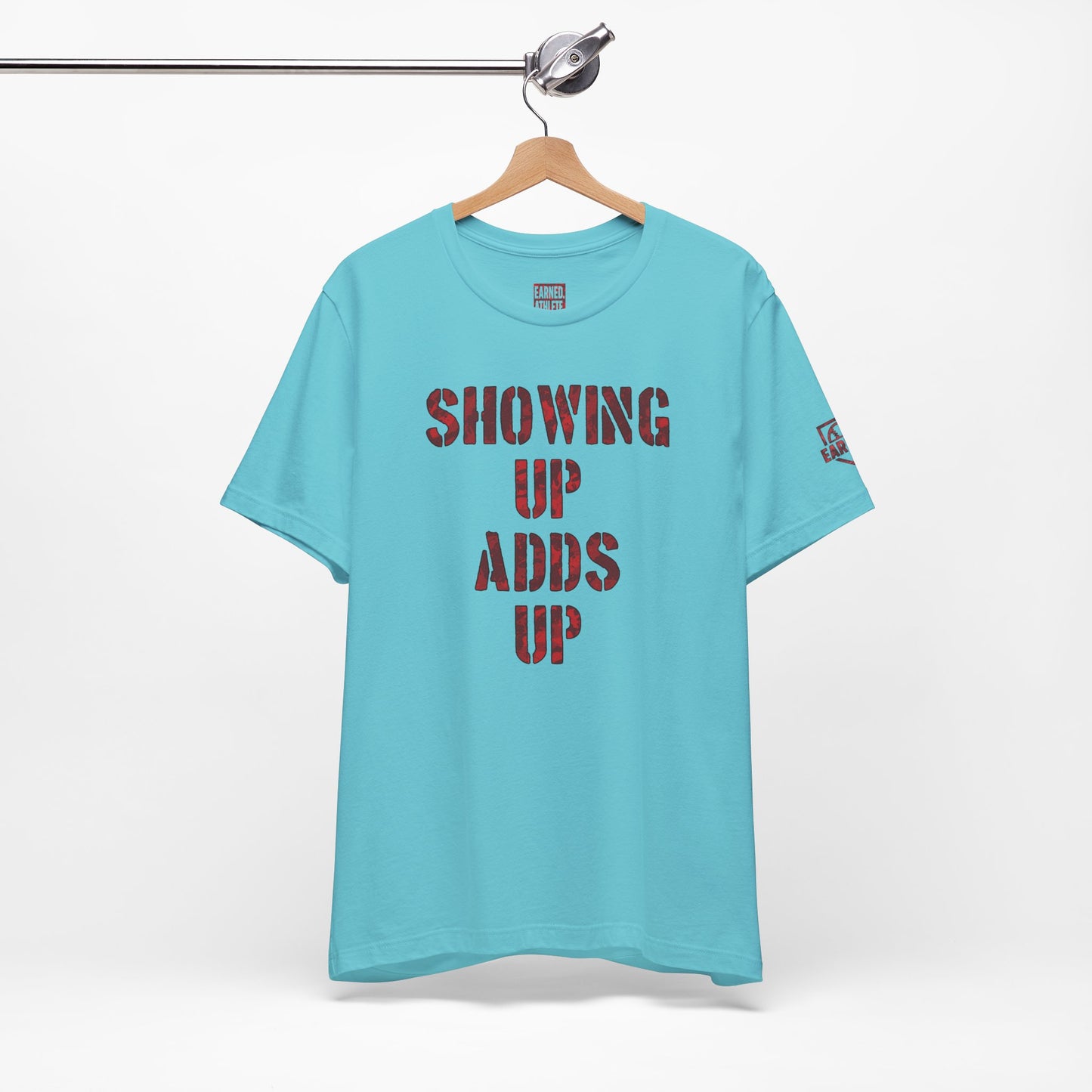 SHOWING UP ADDS UP Tee (Red Camo Font)