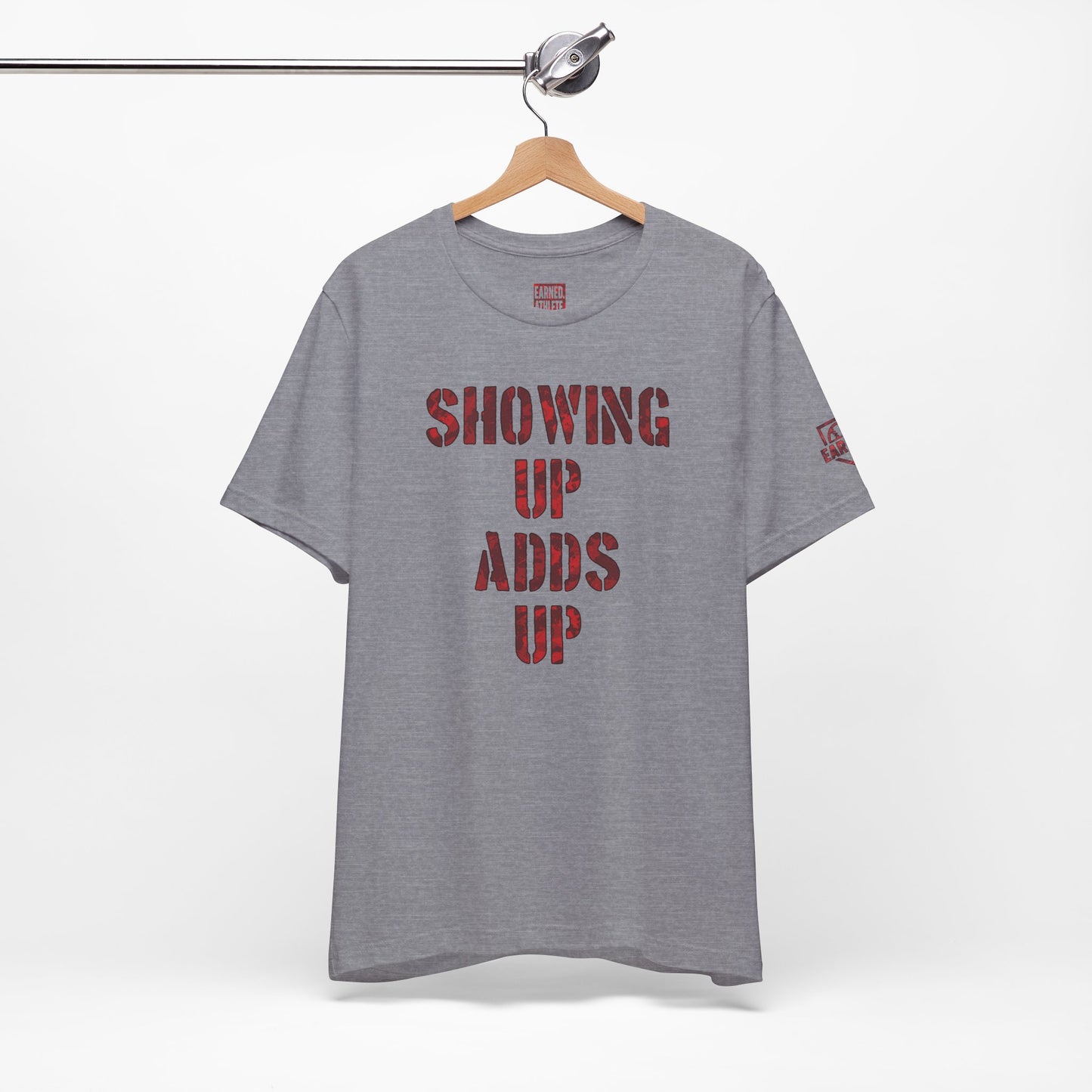 SHOWING UP ADDS UP Tee (Red Camo Font)